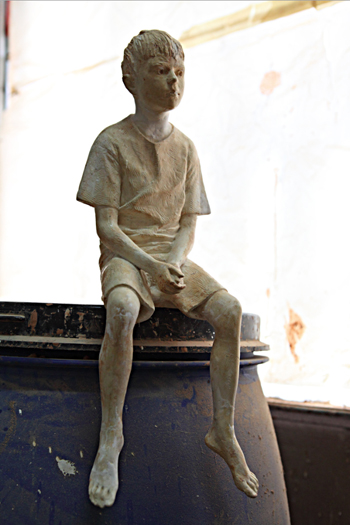 Escultura de un chico